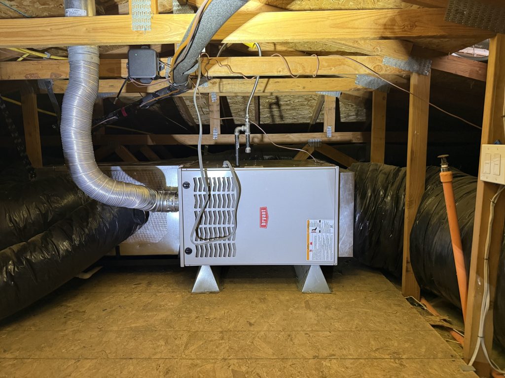 Freshly installed heating unit with adequate spacing from the lower layer, done by a professional heating company